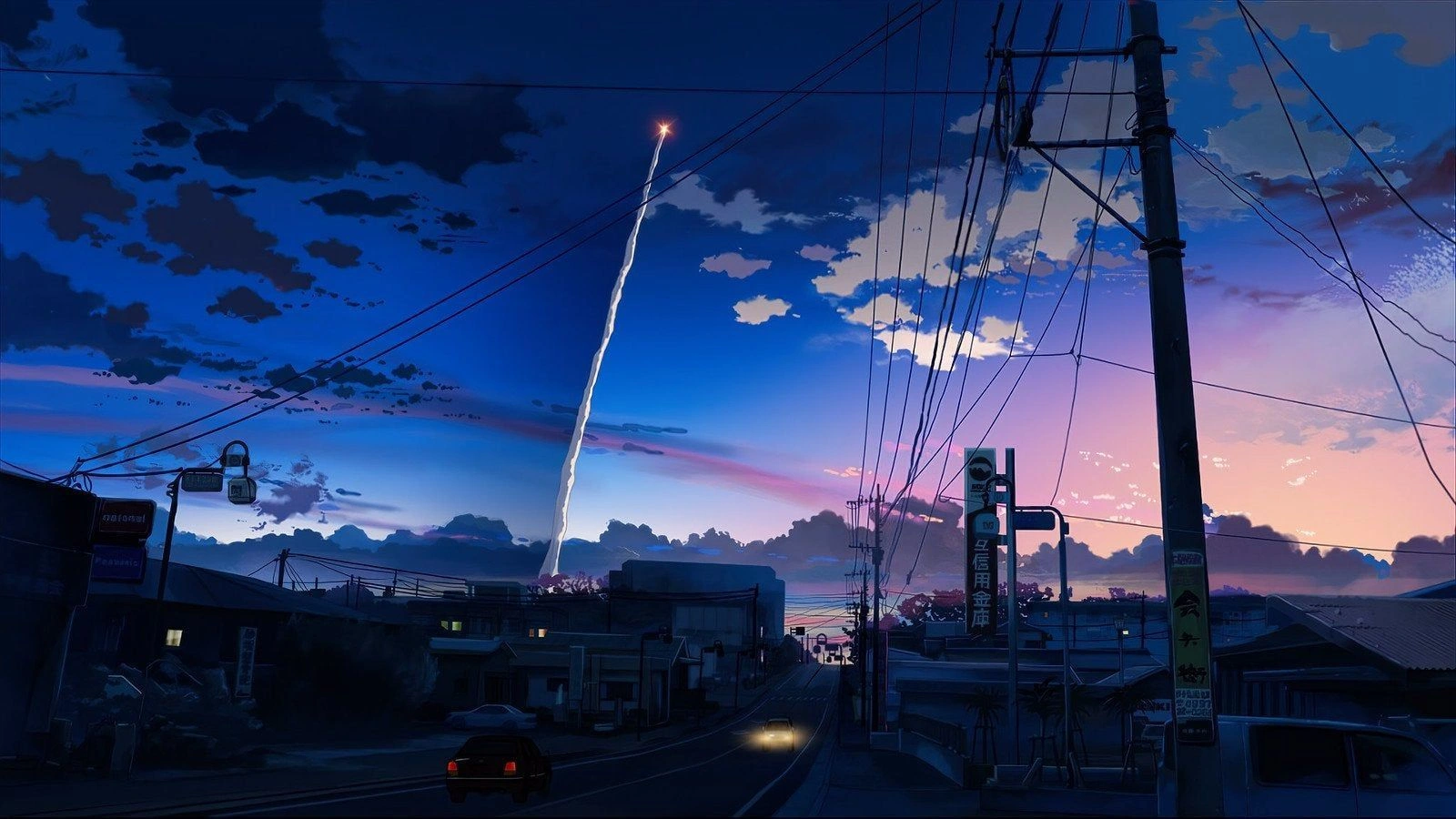 暮色の空とロケットの軌跡
